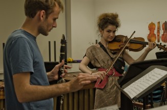 A Viola and Clarinet player performing